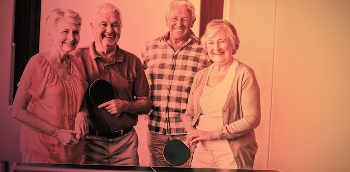 Seniors playing ping-pong in a retirement home