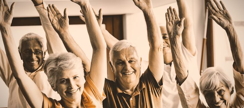 Seniors doing exercises in a retirement home