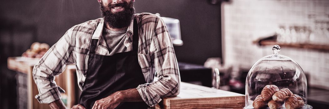 Portrait of a casual hipster in the bakery shop