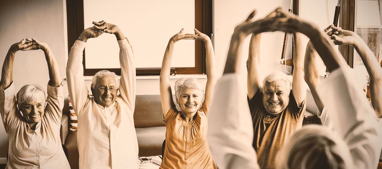 Seniors doing exercises in a retirement home