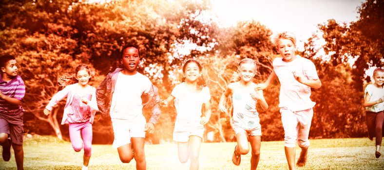 Kids playing together during a sunny day at park