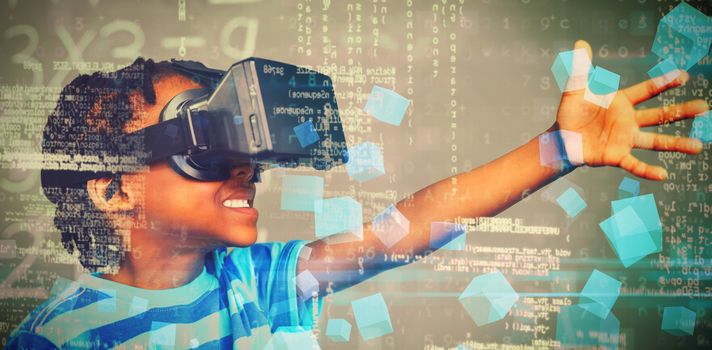 School boy in virtual reality glasses in classroom at school