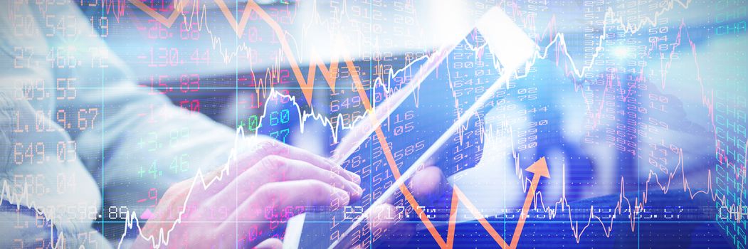 Stocks and shares against midsection of businessman using digital tablet