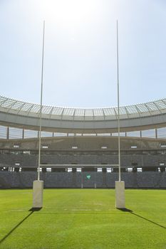 Empty Rugby goal post on a sunny day in the stadium