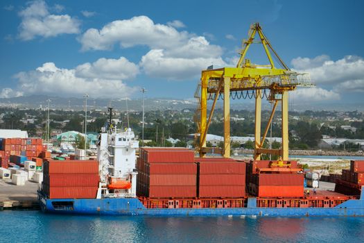 A freight shipping operation on a tropical coast