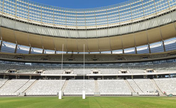 Empty Rugby goal post on a sunny day in the stadium