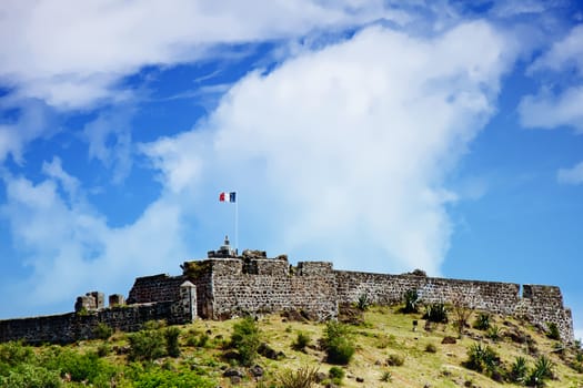 An old French fort built of stone on top of a hill