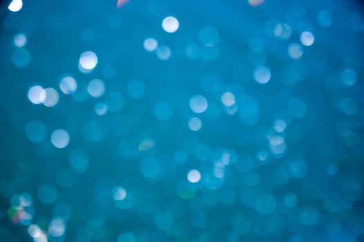 Blue bokeh abstract background.