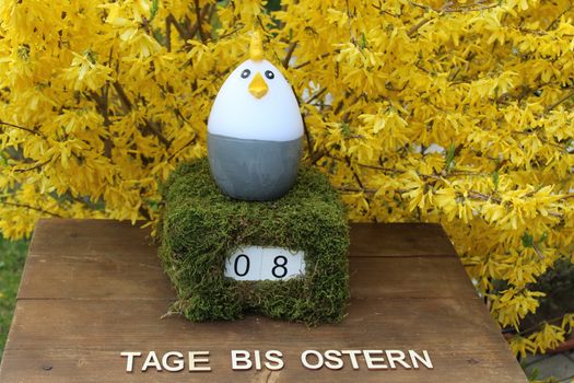 The picture shows an easter countdown with the german text days until easter