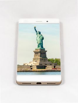 Modern smartphone with picture of Statue of Liberty, New York City, USA. Concept for travel smartphone photography. All images in this composition are made by me and separately available on my portfolio