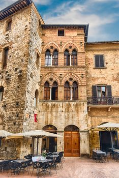 The medieval architecture of San Gimignano, iconic town in the province of Siena, and one of the most visited place in Tuscany, Italy