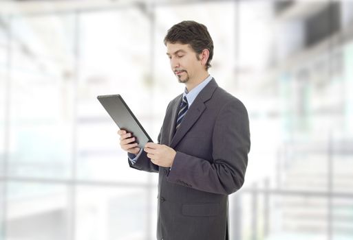 businessman using touch pad of tablet pc, at the office