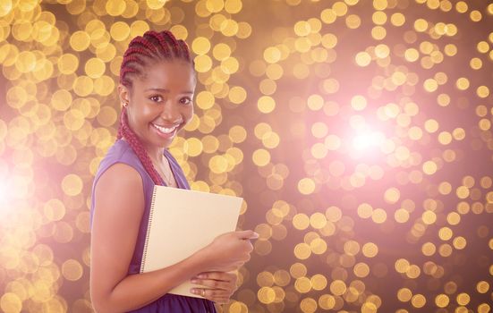 young happy african girl student with lights as background