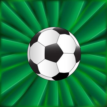 A typical football over a green material background