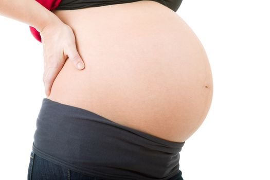 Closeup of pregnant woman at white background