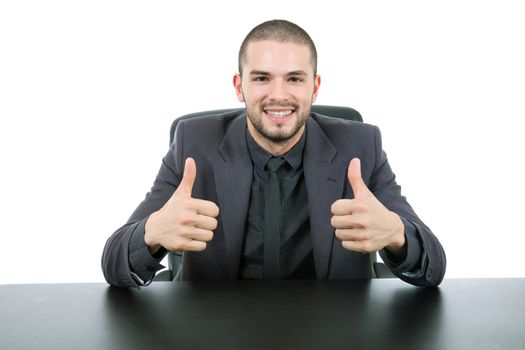 happy business man on a desk, isolated on white