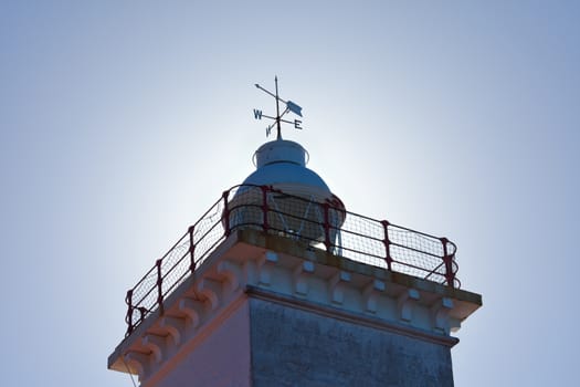 A close-up of the lighthouse at Cape St Blaize with a sunlight glow, Mossel Bay, South Africa