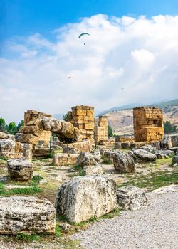 The ruins of the ancient city of Hierapolis in Pamukkale, Turkey, on a sunny summer day