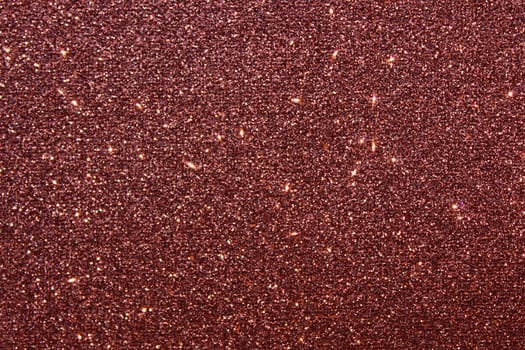 The picture shows a background with red glittery paper