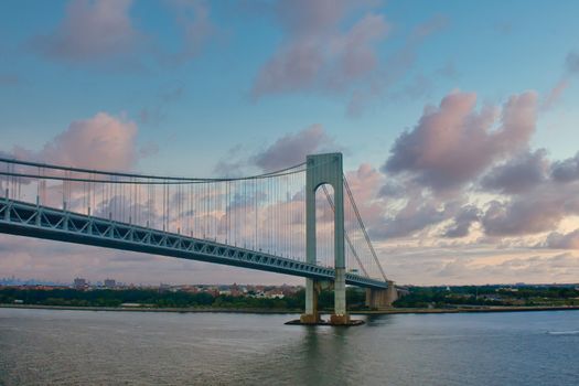 A classic suspension bridge across a shipping channel