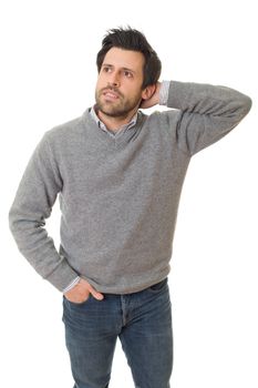 young casual man thinking, isolated on white background