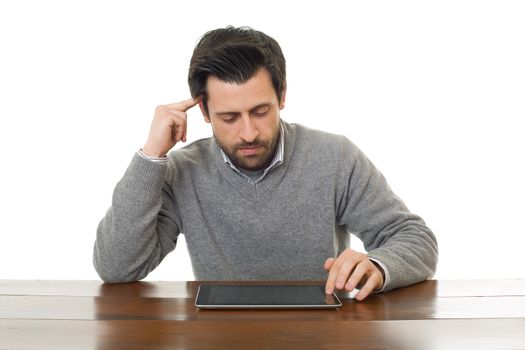 man on a desk working with a tablet pc, isolated