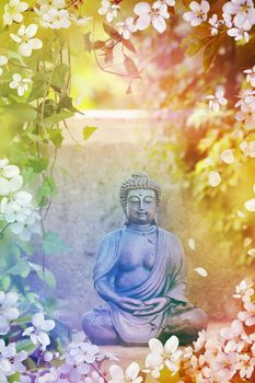 Buddha garden statue with vines and apple blossoms