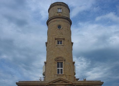 Big stone lighthouse near Cherbourg, France