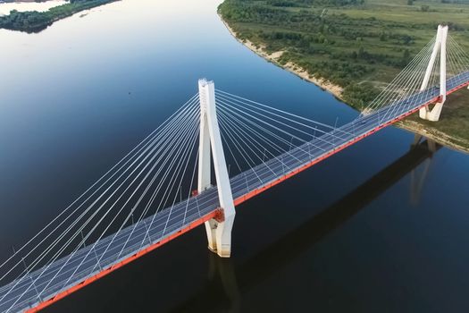 Beautiful bridge over the river. The bridge on the cables is road.