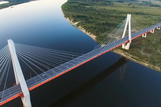 Beautiful bridge over the river. The bridge on the cables is road.