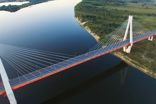 Beautiful bridge over the river. The bridge on the cables is road.