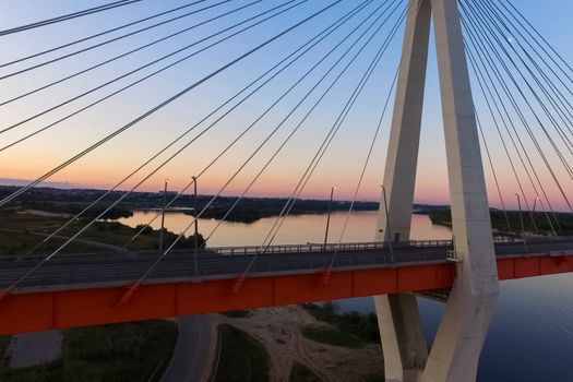 Beautiful bridge over the river. The bridge on the cables is road.