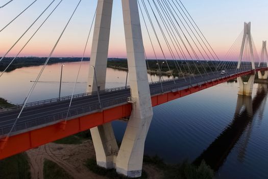 Beautiful bridge over the river. The bridge on the cables is road.