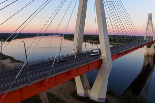 Beautiful bridge over the river. The bridge on the cables is road.