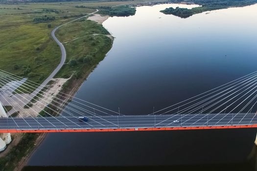 Beautiful bridge over the river. The bridge on the cables is road.