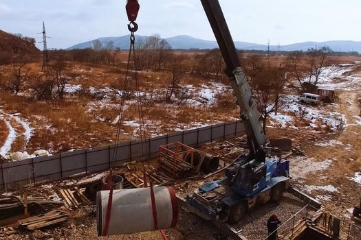 Irkutsk, Russia - March 24, 2017: A platform with equipment for pipeline operations. Pipe penetration. Pipes of a gas pipeline, construction and laying of pipelines for transportation of gas and oil.