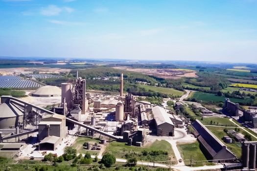 Large cement plant. The production of cement on an industrial scale in the factory.