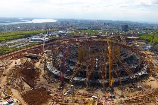Moscow, Russia - May 12, 2018: Equipment for the construction of the stadium. Tower cranes and construction machinery. Construction of the stadium.