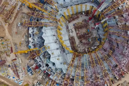 Moscow, Russia - May 12, 2018: Equipment for the construction of the stadium. Tower cranes and construction machinery. Construction of the stadium.