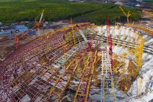 Moscow, Russia - May 12, 2018: Equipment for the construction of the stadium. Tower cranes and construction machinery. Construction of the stadium.