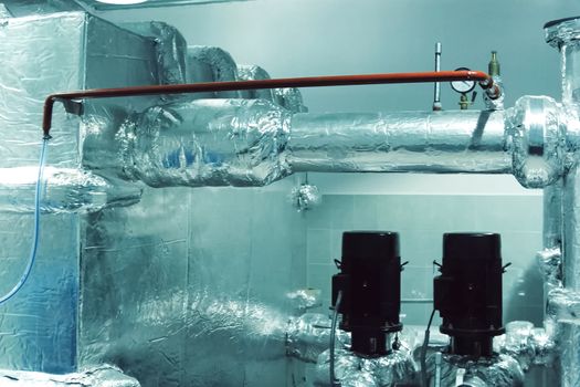 Thermal insulation of a pipes with foil.