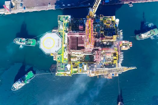 Bergen, Norway - June 27, 2014: Drilling platform in the port. Towing of the oil platform.