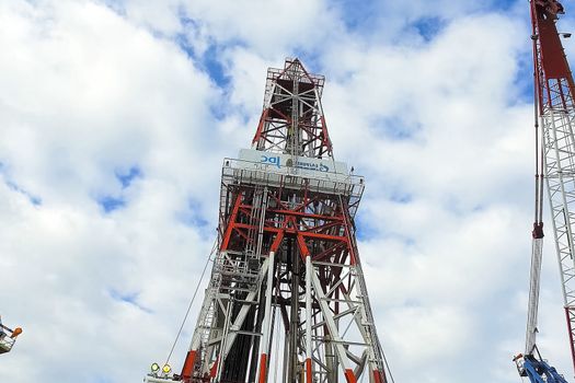 Oil offshore platform in the sea. Extraction of oil on the shelf.