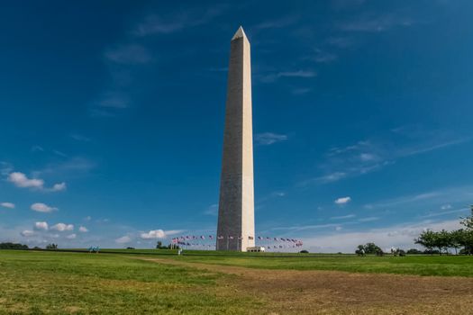 Washington, USA - June 23, 2017: Daylight side view of Washington Monument in Washington, DC, capital city of the USA.