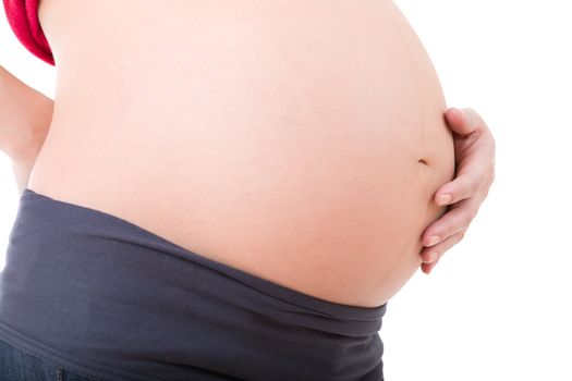 Closeup of pregnant woman at white background