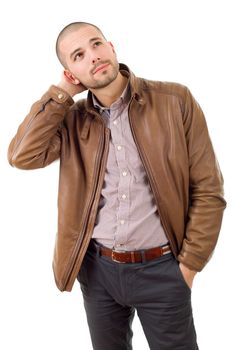 young casual man thinking, isolated on white background