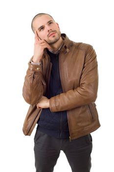 young casual man thinking, isolated on white background