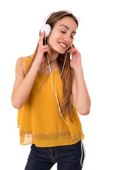 Beautiful young woman listen music with headphones, isolated on white