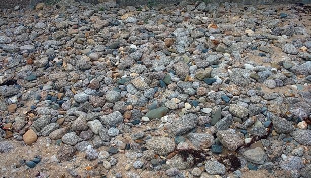 Many rocks close to Atlantic ocean shore