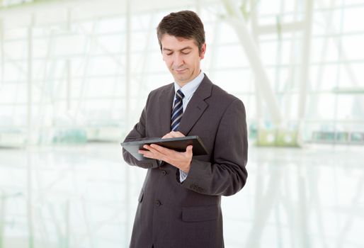 businessman using touch pad of tablet pc, at the office